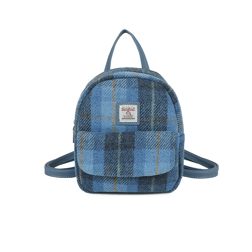 Strathurie Fashion Accessory Wholesaler Glasgow a blue plaid backpack with a white label
