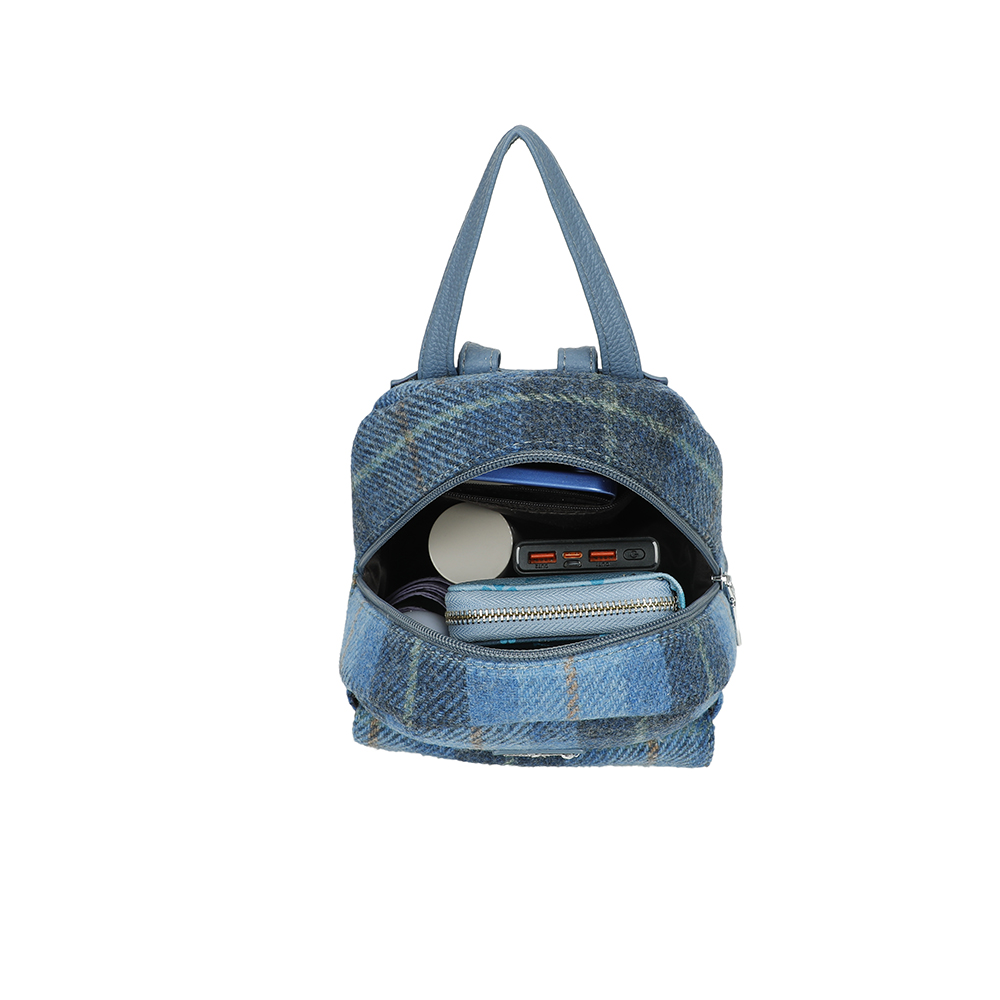 Strathurie Fashion Accessory Wholesaler Glasgow a blue bag with a pocket full of items